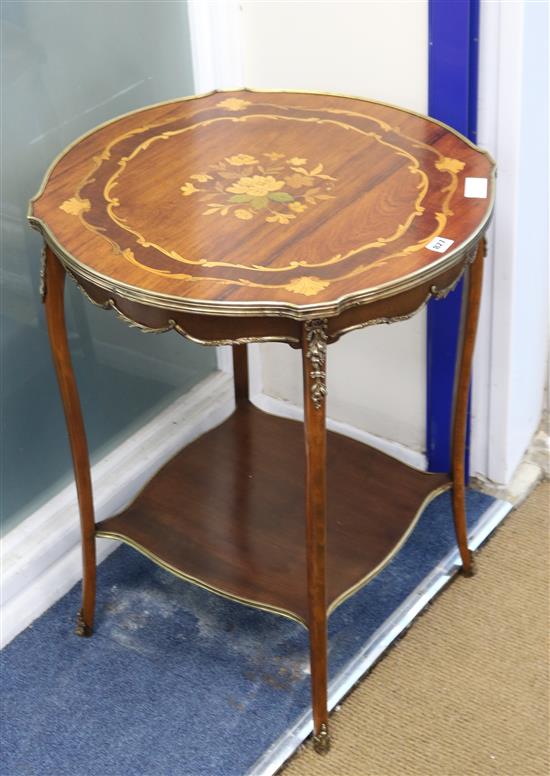 A Louis XV style marquetry inlaid 2 tier table, with gilt metal mounts W.58cm